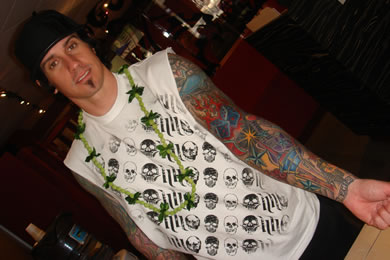 Carey Hart shows off his newest tattoo, the Vegas skyline.