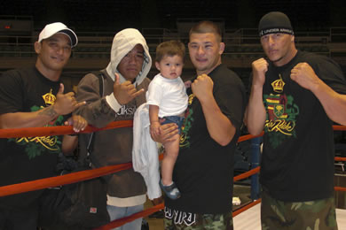 Darren Torres, Devon Kauwe, Richard Des Forge with 1-year-old son Maximus and Johnny Pestana of Team