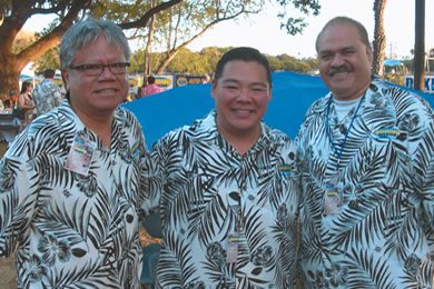 Hawaiian105 KINE director of systems operation Peter Agustin with radio personalities Wade Faildo