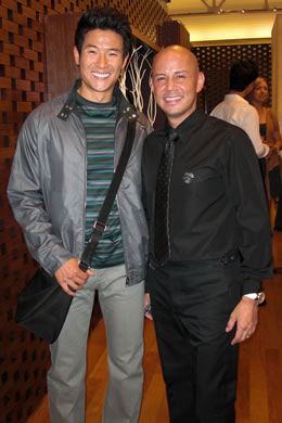 Model Michael Hsia with Louis Vuiton Waikiki store director Brian Bice.