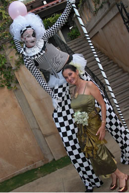 A clown on stilts (pictured here with Condesa Azria Nora Meijide-Gentry) greeted guests as they arri