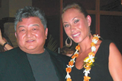MidWeek publisher Ron Nagasawa who served as one of the guest judges with the Best Legs winner Renee