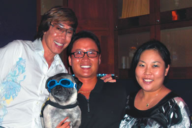 Glamour photographer Russell Tanoue in the VIP section with Dr. David Yew