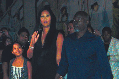 Kimora arrives with daughter Ming Lee and husband Djimon Hounsou.