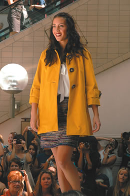 Rain Rusden models an outfit by Kate Spade New York.