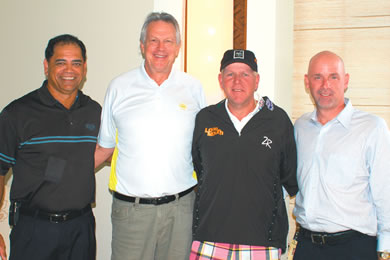 Friends of Hawaii Charities president Corbett Kalama, tournament director Ray Stosik, John Daly and 