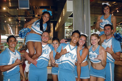 Hawaii Pacific University cheerleaders Eddie Akahi, April Huliganga, Tom Peluso, Malyssa Barbasa, Co