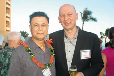 Japan-America Society of Hawaii (JASH) president Ed Hawkins (left) with Halekulani Corporation COO P