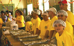 NCTAMS volunteers stand by to start the serving line for Operation Aloha, a Nov. 23 feast held at Waialua Community Center for 400 North Shore residents. Photo from Chief Christopher Stone.