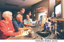 The team in an editing session, putting together title graphics