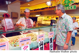 Tadatoshi Suzuki with a Japanese demonstrator at the sweet rice counter