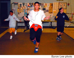 Lawrence Paelma, Carlos Tangero and Hannah Smith jump rope