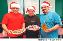 Joe and Jerry Tramontano and cousin Anthony Romano with their favorite Christmas goodies
