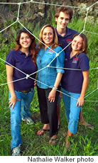 Gregoire with Mareva Cosco, Bryce Harken and Tina Cournede. At camp, as a trust-building exercise teens lift and pass campmates through openings in the rope fence without touching it