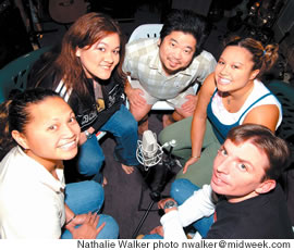From left, Tiki Suan, Jenn Wright, Trey Terada, Mailani Makainai and Vern Brown at the mike