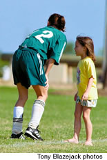 Jimie Napoleon-Kanaha, 6, gives her mother Pomai some mid-game advice during a match at the Waipio Soccer Complex