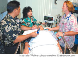 From left, nurse Dwayne Fedalizo, Dr. Celia Ona and nurse Ben Nelson prepare to give a patient electroconvulsive therapy