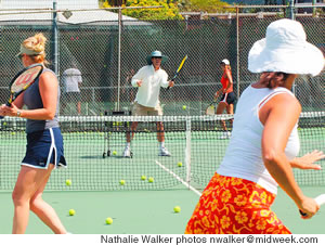 Cardio Tennis instructor Henry Somerville keeps students moving