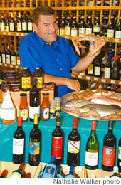 Mark Berwick with a sampling of Aussie seafood, wines and other wares