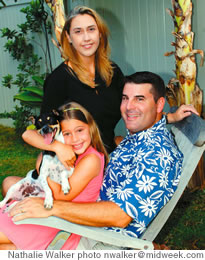 At home with wife Leana, daughter Holly and pooch Chico