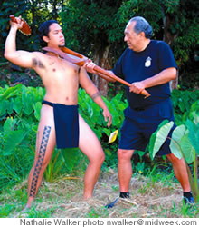 Wes Kaiwi Nui Yoon, left, with his lua teacher, Mitchell Eli
