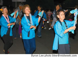 Joyce Fujishige, Dale Yamashita and Barbara Nishioka join the dancing at Palolo