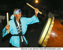 Ken Kunichika bangs the taiko drum