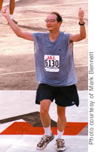The AG crosses the Honolulu Marathon finish line