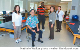 Taking a break in the REHAB physical therapy room (from left): Stephanie Matsunaka, Gary Okamoto, Jerry Wheeler, Lorna Ancheta and Audrey Torres