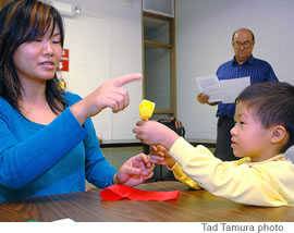 Christy Qin and her 4-year-old son, Zachary, make a paper rose that actually smells like the real thing!