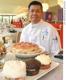 MAC 24-7 executive chef Ray Dasalla with some of the restaurant’s outsized portions