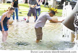 Shari Finchum and Alex Cruz get wet searching for the answer to a clue