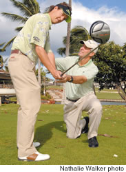 McLachlin gets a pointer from his first coach, Greg Nichols, at Ko Olina last week