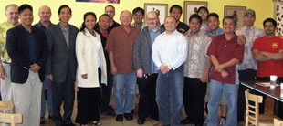 L&L president Eddie Flores (fourth from left) and director of marketing Brandon T. Dela Cruz (second from left) pose with San Francisco franchisees