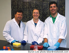 Hard at work in the science lab are (from left) Dr. Andrew 'David' Hieber, Cristi Richards and Nick Shubin