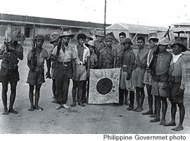 Filipino Old Scouts capture a Japanese flag on Luzon