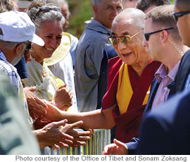 The Dalai Lama's sense of humor is contagious as he meets and greets followers