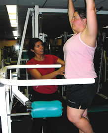 Meadow Gold Women’s Challenge contestant Natasha Piper sweating it out with 24 Hour Fitness trainer Alana Gonzales