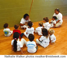 Mestre Kinha teaches students capoeira chants