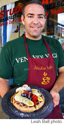 Studio Cafe owner Greg Heller with Malted Belgian Waffles with Fruit