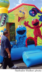 Delbert Kim with the popular Sesame Street bounce house