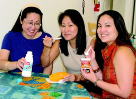 Joy Yamada, Yolanda Mandawe and Wendy Fujimoto enjoy some healthful snacks