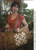 Eva Laird-Smith with one of her Laird of Hawaii creations