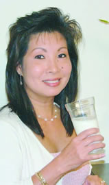 Denise Sasaki drinking a small portion of Acidophilus milk