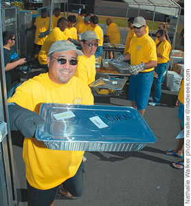 Volunteers deliver a warm Thanksgiving meal