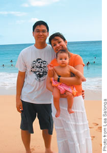 On the beach in Hawaii with husband Robert Chien and baby Nicole