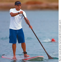 Donovan Dela Cruz paddles at Ala Moana