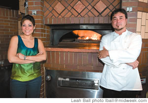 Elizabeth Hata Watanabe and Chef Alexio Thomas Corleon in Harbor Court Bistro's kitchen