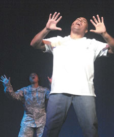 Sgt. Sam Hesch belts out a song in the 2006 U.S. Army Soldier Show. Photo from Linda Hesch.