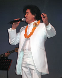 Danny Couch sings his heart out on the opening night of his new show at the Sheraton Princess Kaiulani. Photo by Rasa Fournier.